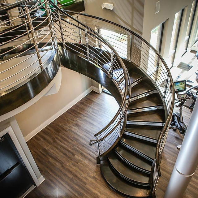 Villa classical Custom Solid Wood Curved Stairs With Steel Rod Railing
